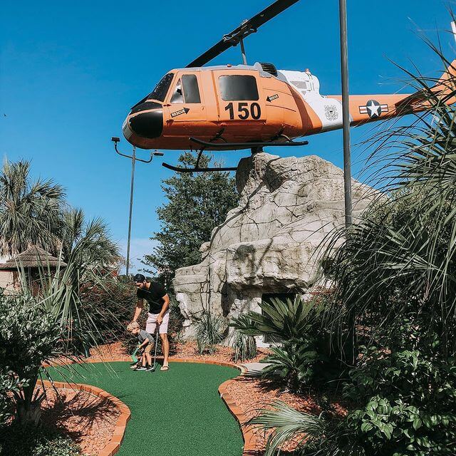 I'm doing my best to teach Miles to play golf